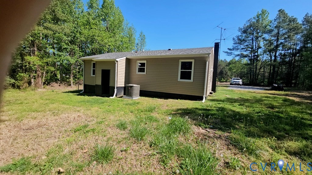 27368 Prince Edward Highway Rice, VA 23966 - Photo 18 of 18 a view of a house with backyard and a tree