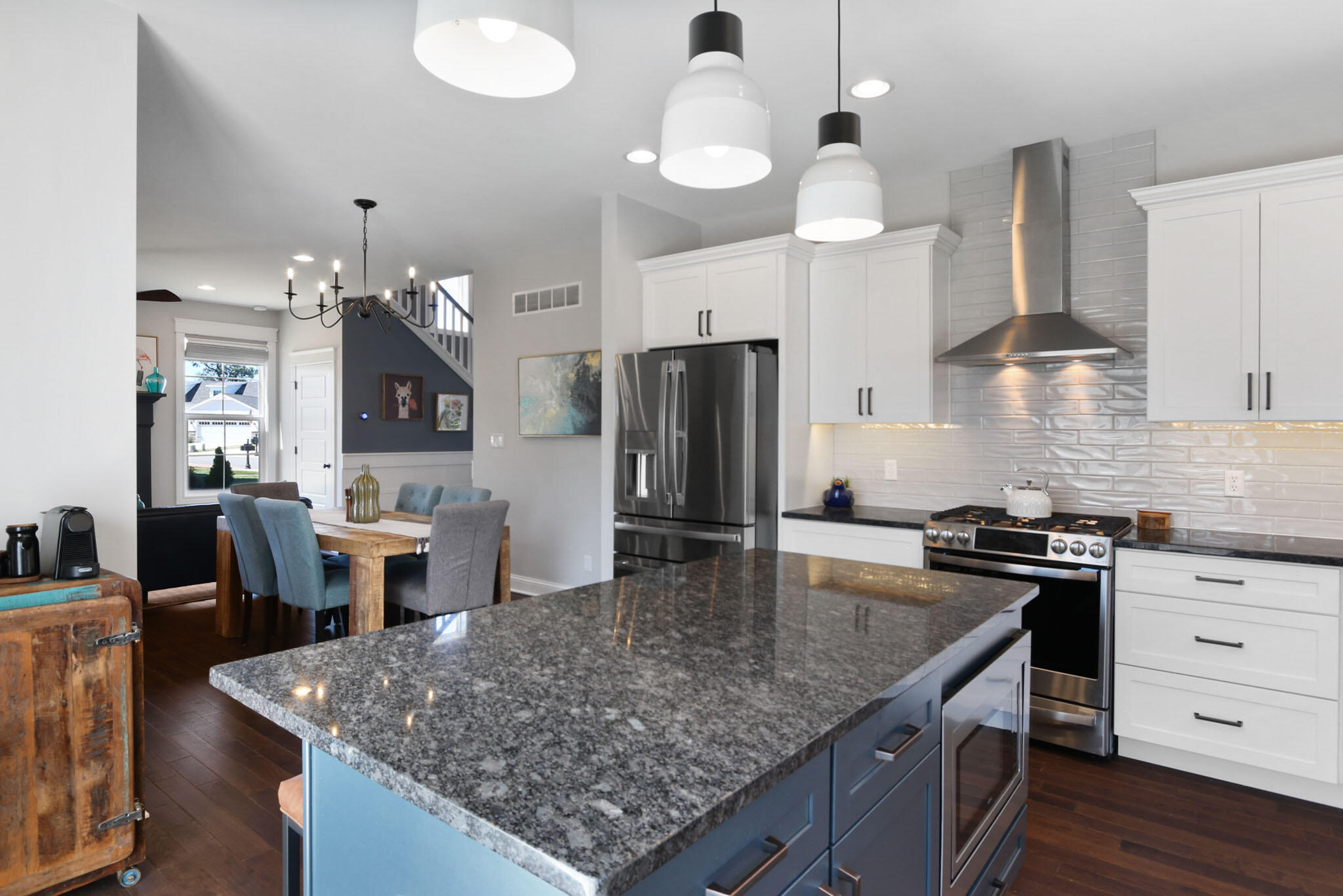5937 South Dune Harbor Drive Portage, IN 46368 - Photo 14 of 44 a kitchen with stainless steel appliances granite countertop a sink a stove and a refrigerator