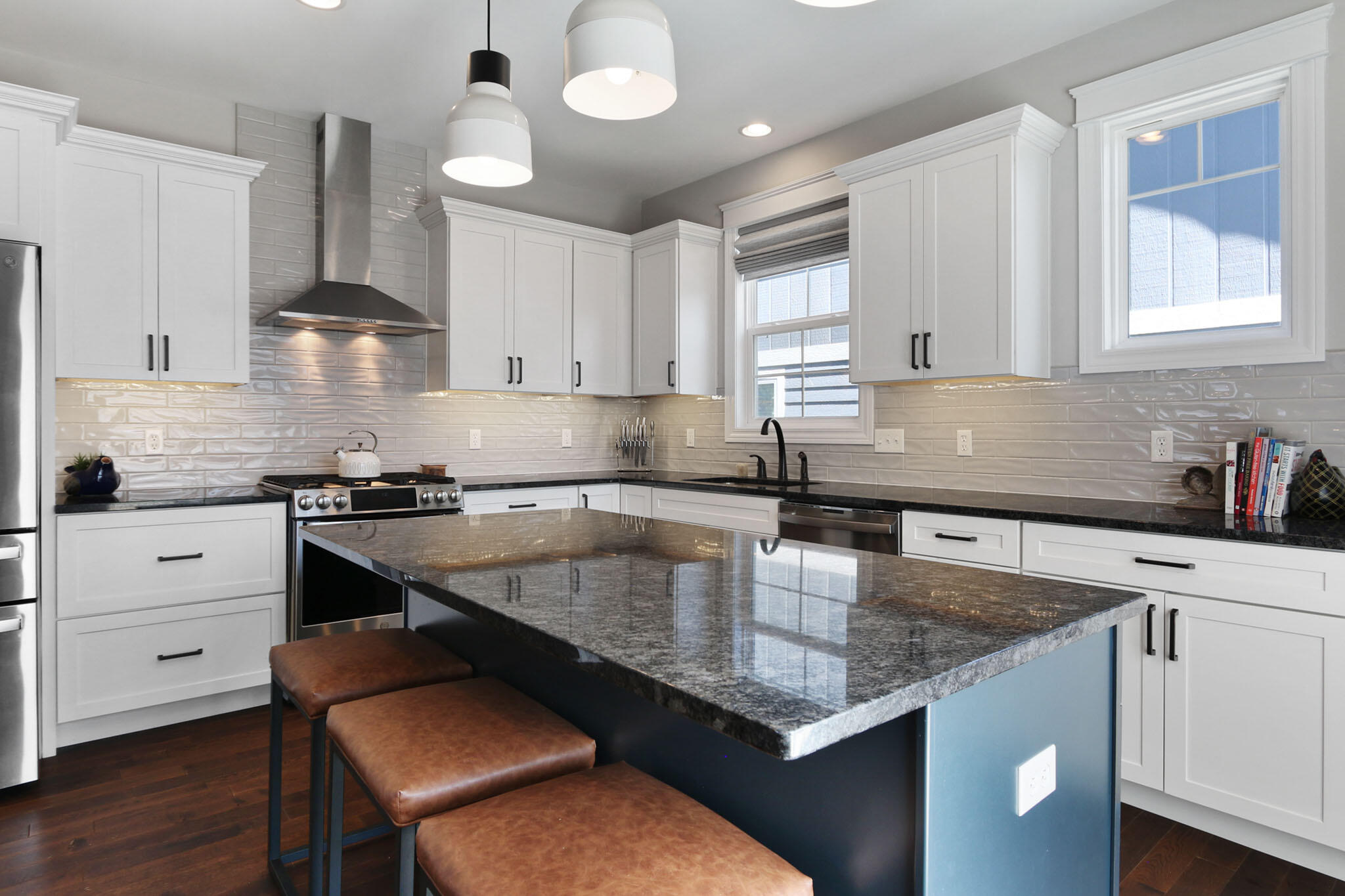 5937 South Dune Harbor Drive Portage, IN 46368 - Photo 15 of 44 a kitchen with granite countertop a sink a counter space appliances and cabinets