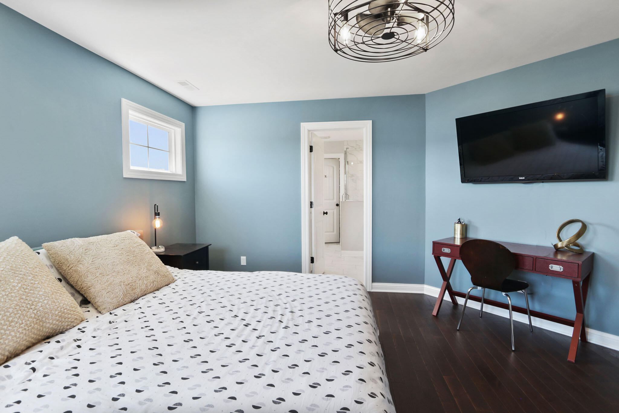 5937 South Dune Harbor Drive Portage, IN 46368 - Photo 21 of 44 a bedroom with a bed and a flat screen tv