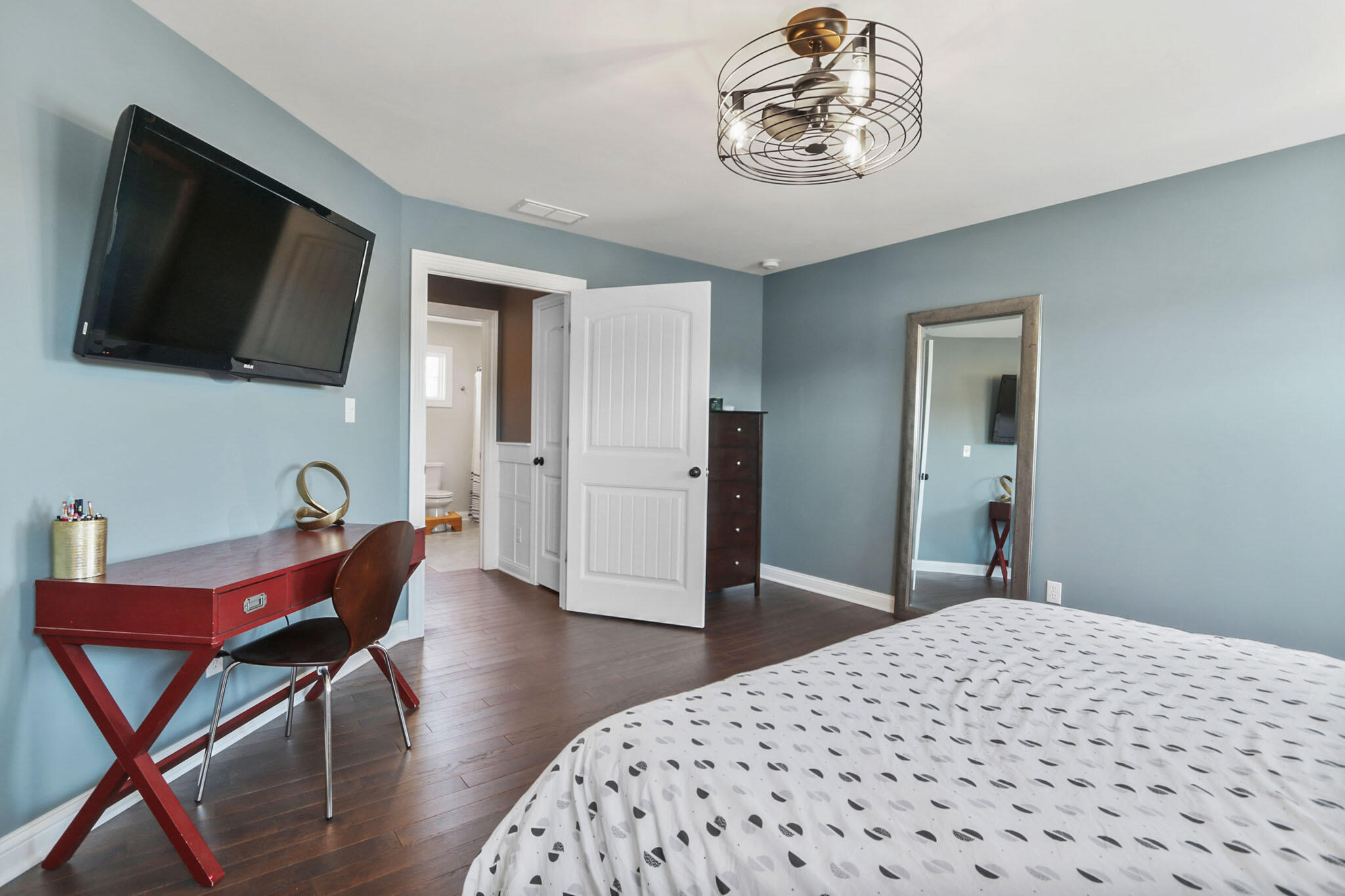 5937 South Dune Harbor Drive Portage, IN 46368 - Photo 22 of 44 a bedroom with a bed and a flat screen tv