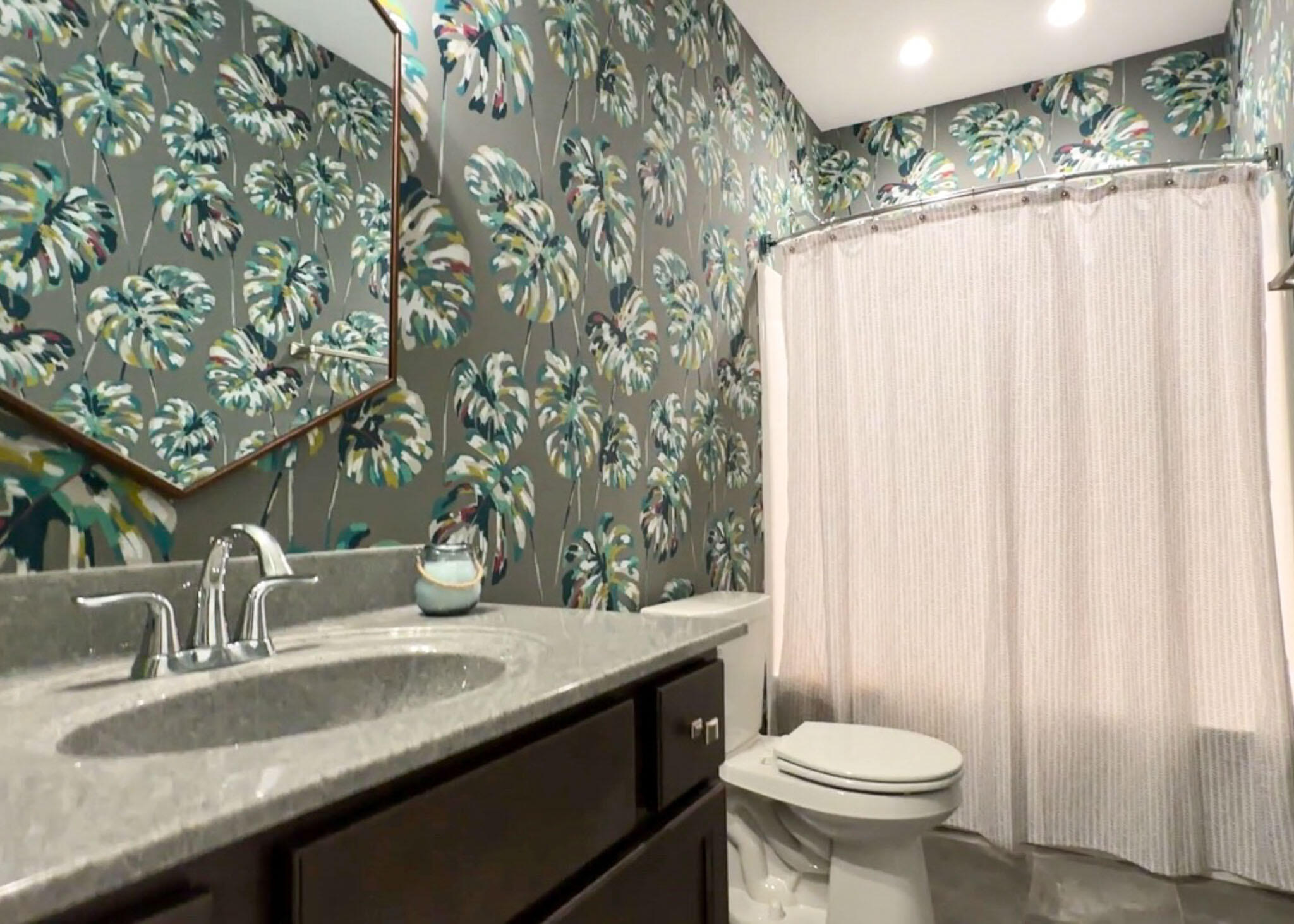 5937 South Dune Harbor Drive Portage, IN 46368 - Photo 33 of 44 a bathroom with a granite countertop sink and a toilet