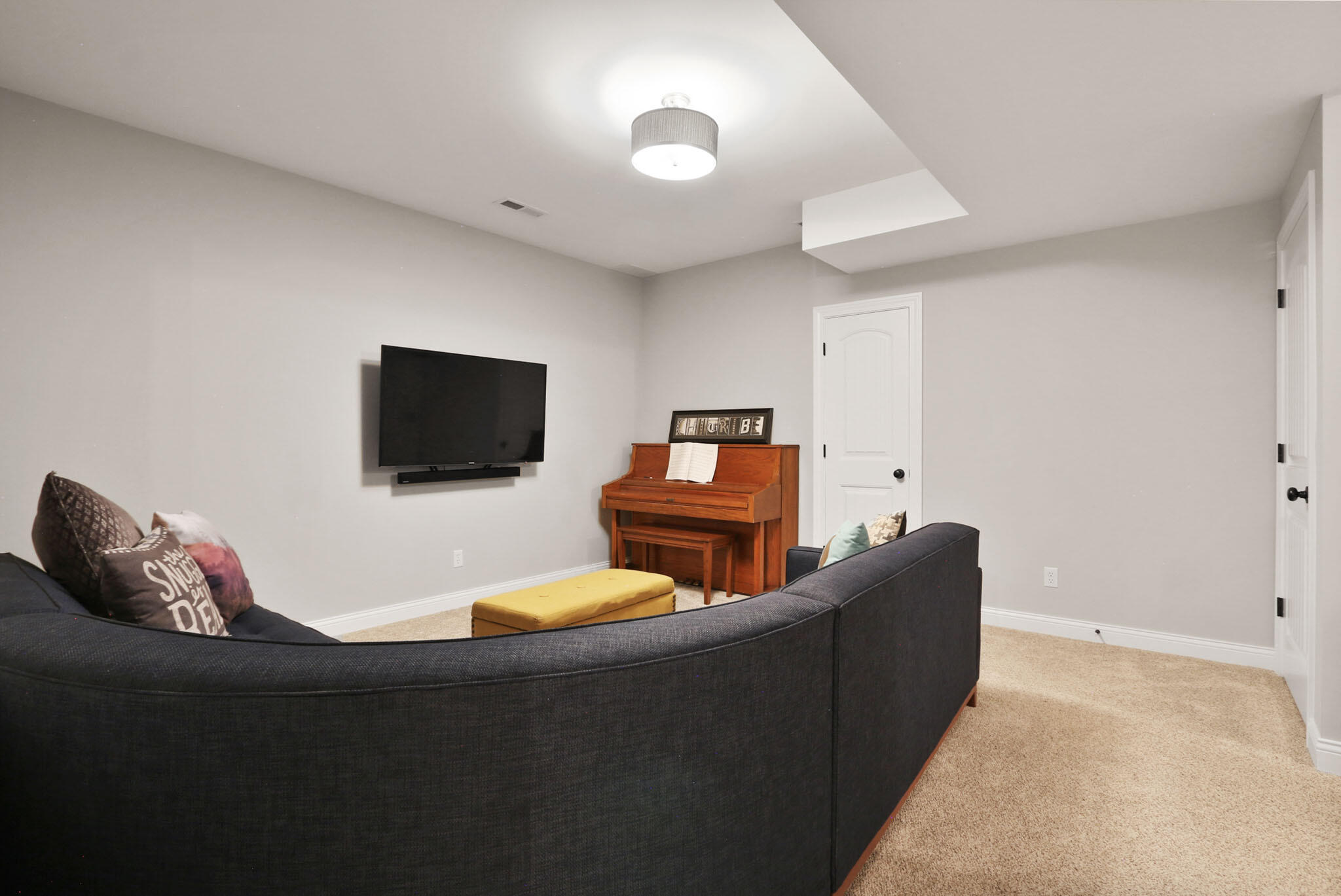 5937 South Dune Harbor Drive Portage, IN 46368 - Photo 34 of 44 a living room with furniture and a flat screen tv