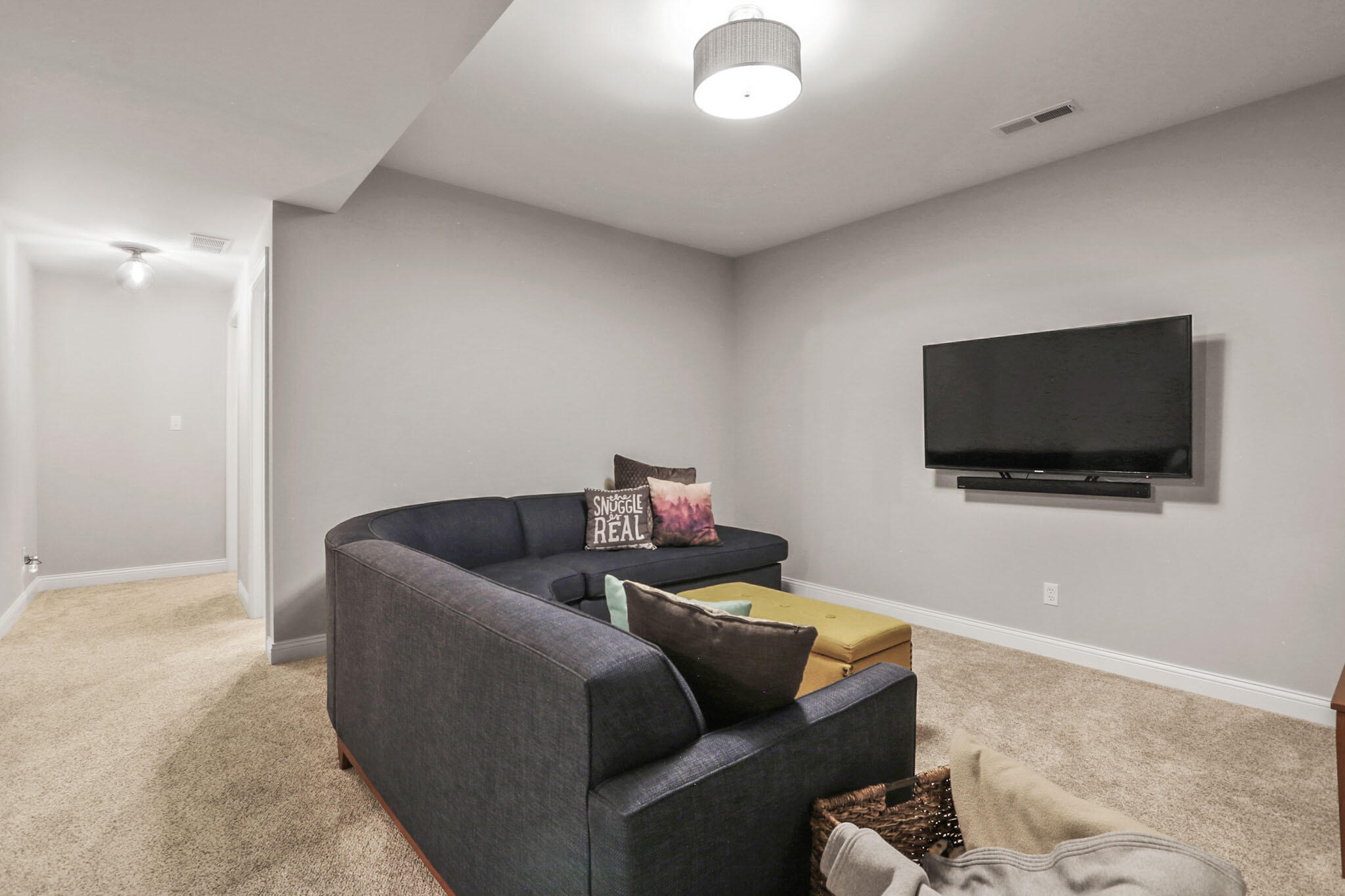 5937 South Dune Harbor Drive Portage, IN 46368 - Photo 35 of 44 a living room with furniture and a flat screen tv