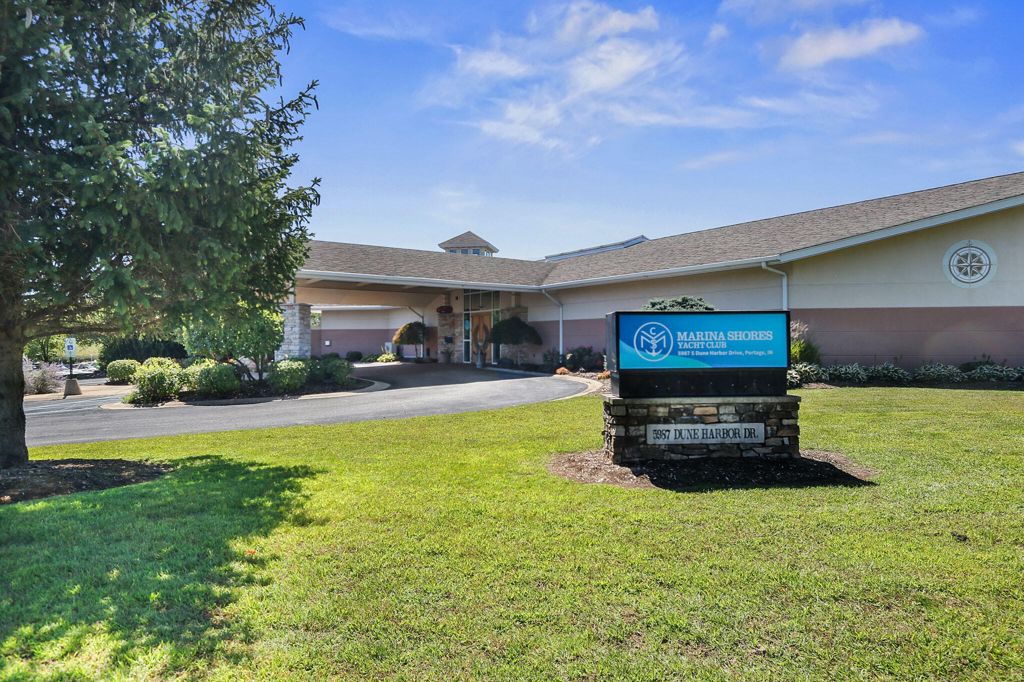 5937 South Dune Harbor Drive Portage, IN 46368 - Photo 40 of 44 a front view of a house with a garden