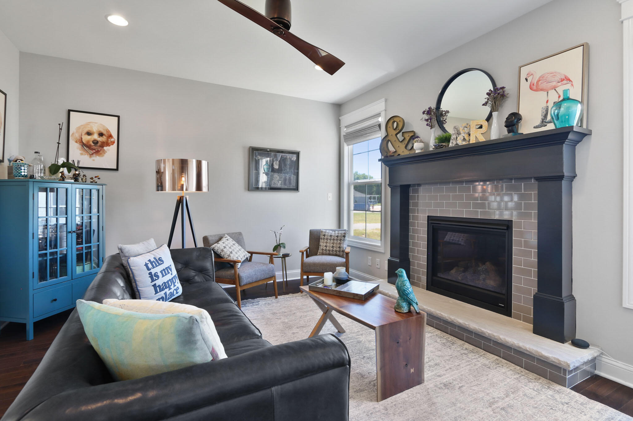 5937 South Dune Harbor Drive Portage, IN 46368 - Photo 10 of 44 a living room with furniture a window and a fireplace