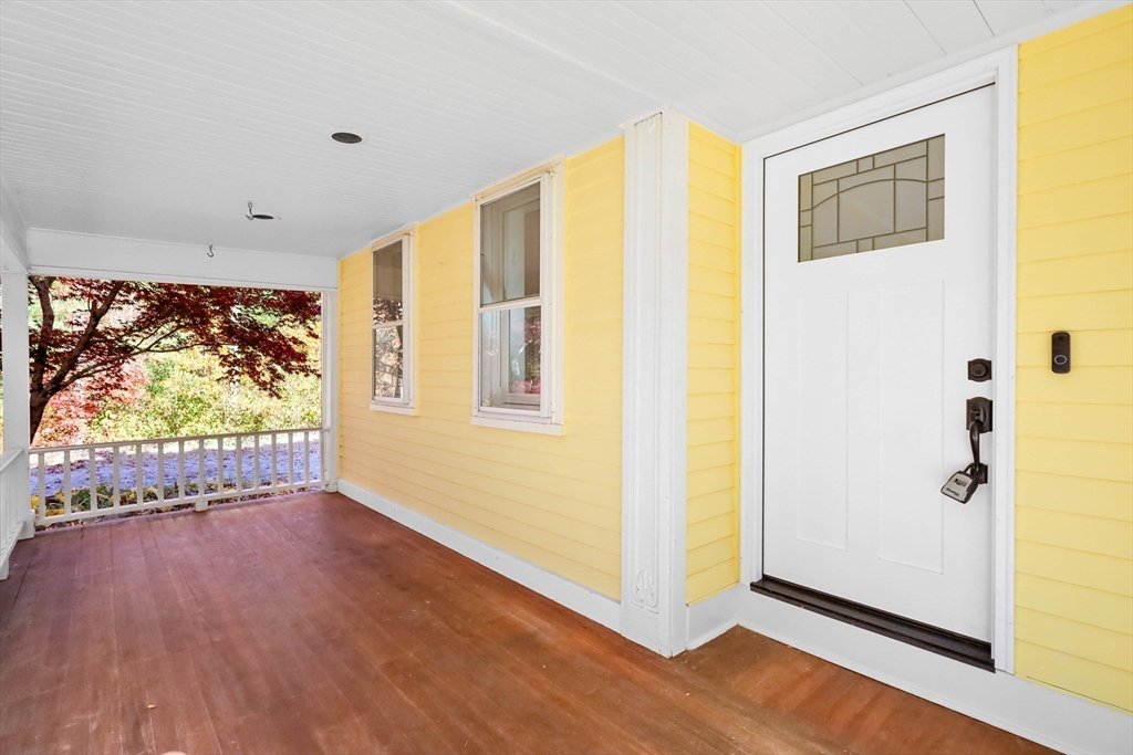 183 Burnt Swamp Road Wrentham, MA 02093 - Photo 2 of 38 a view of an empty room with wooden floor and a window