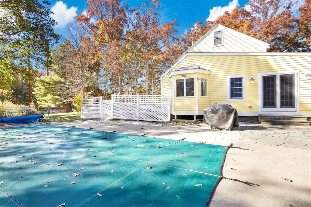 183 Burnt Swamp Road Wrentham, MA 02093 - Photo 32 of 38 a front view of a house with a yard