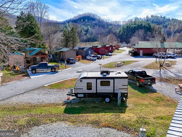 swimming pool view with a sitting space