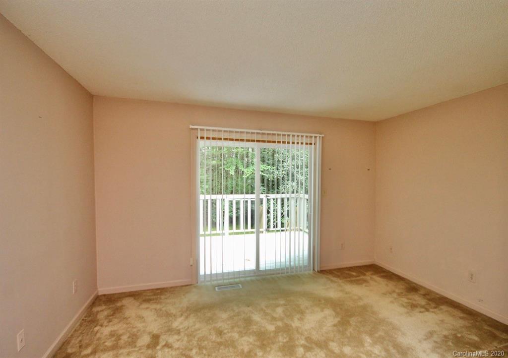10 Dwarf Mountain Road, Unit 22 Sapphire, NC 28774 - Photo 12 of 23 a view of an empty room with a window