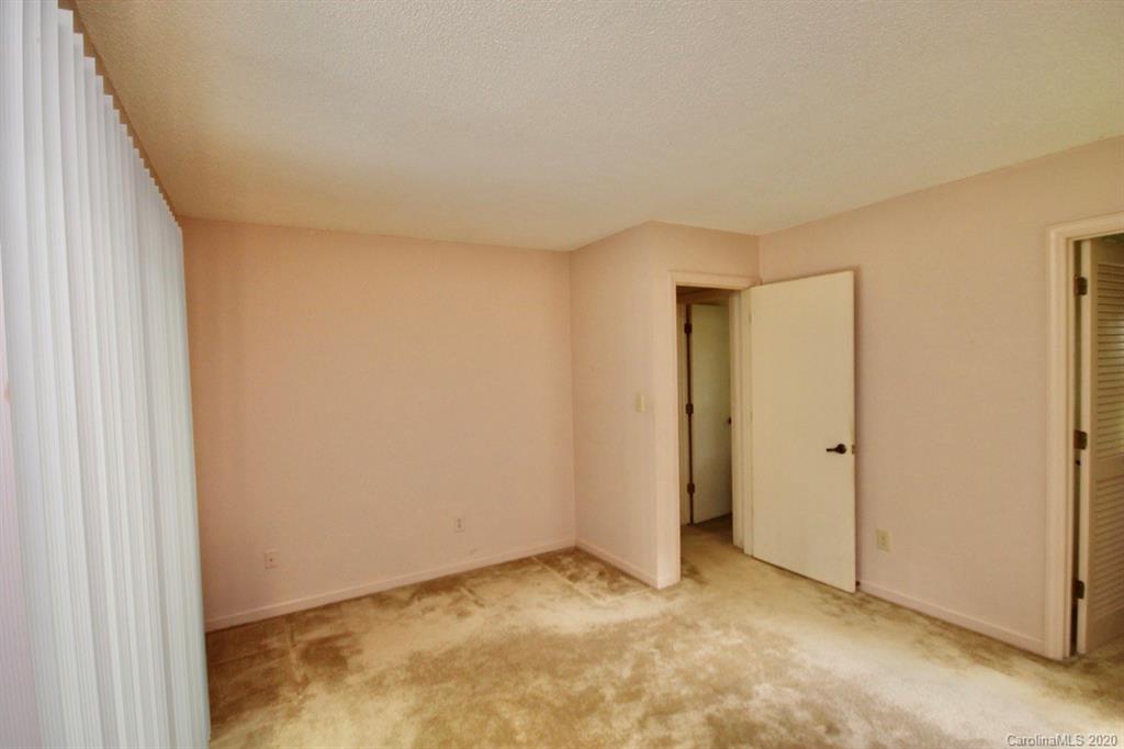 10 Dwarf Mountain Road, Unit 22 Sapphire, NC 28774 - Photo 13 of 23 a view of room with window