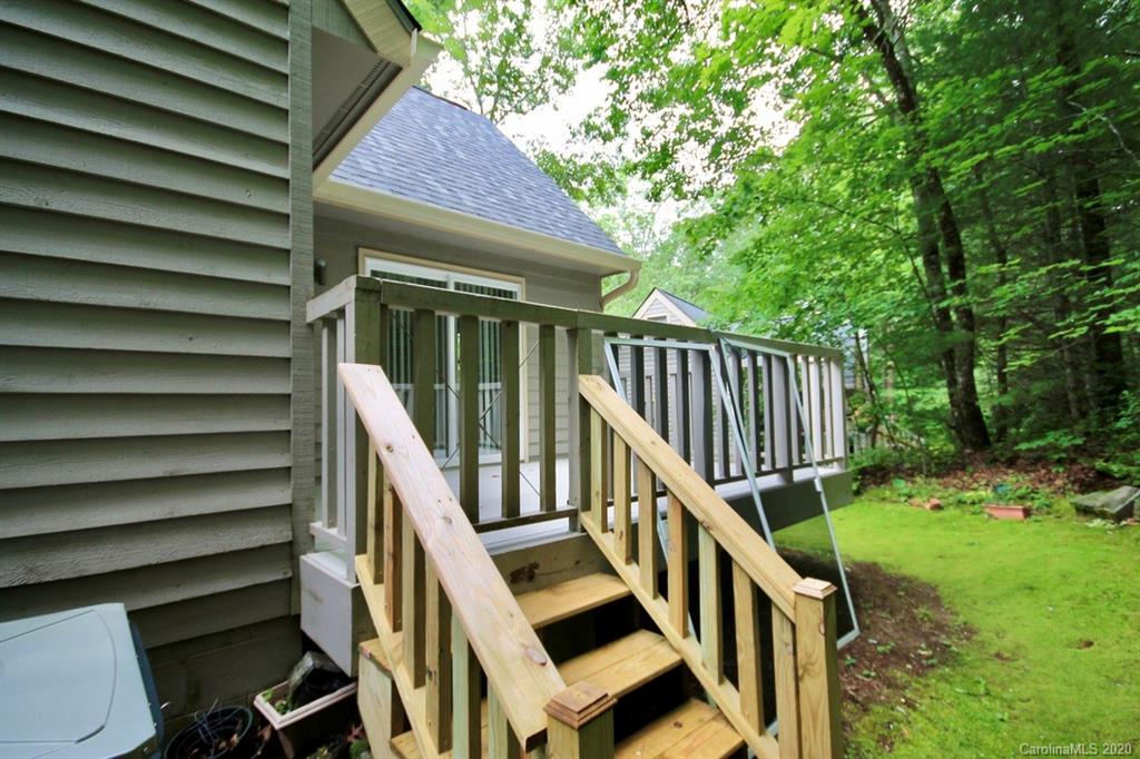 10 Dwarf Mountain Road, Unit 22 Sapphire, NC 28774 - Photo 23 of 23 a view of balcony with deck and stairs