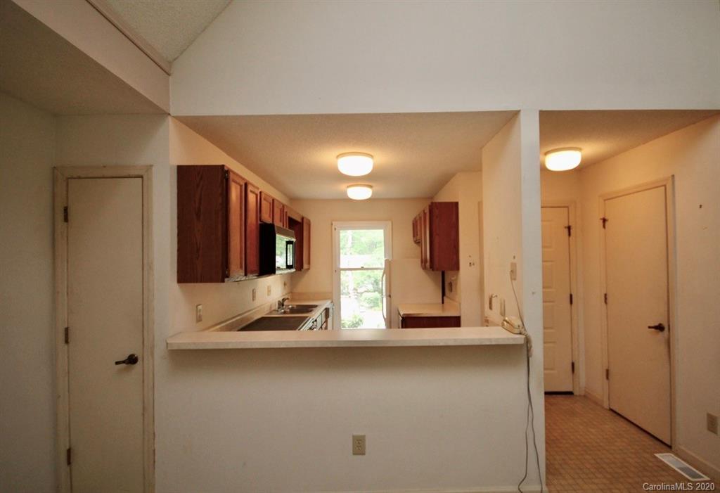 10 Dwarf Mountain Road, Unit 22 Sapphire, NC 28774 - Photo 7 of 23 a view of an entryway with wooden floor