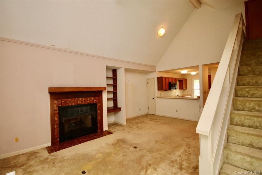 10 Dwarf Mountain Road, Unit 22 Sapphire, NC 28774 - Photo 10 of 23 a view of a livingroom with a fireplace