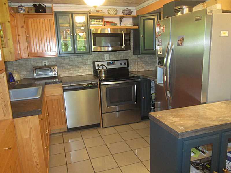 159 Lawton Foster Road North Hopkinton, RI 02832 - Photo 4 of 25 Kitchen. cement counters tin ceiling