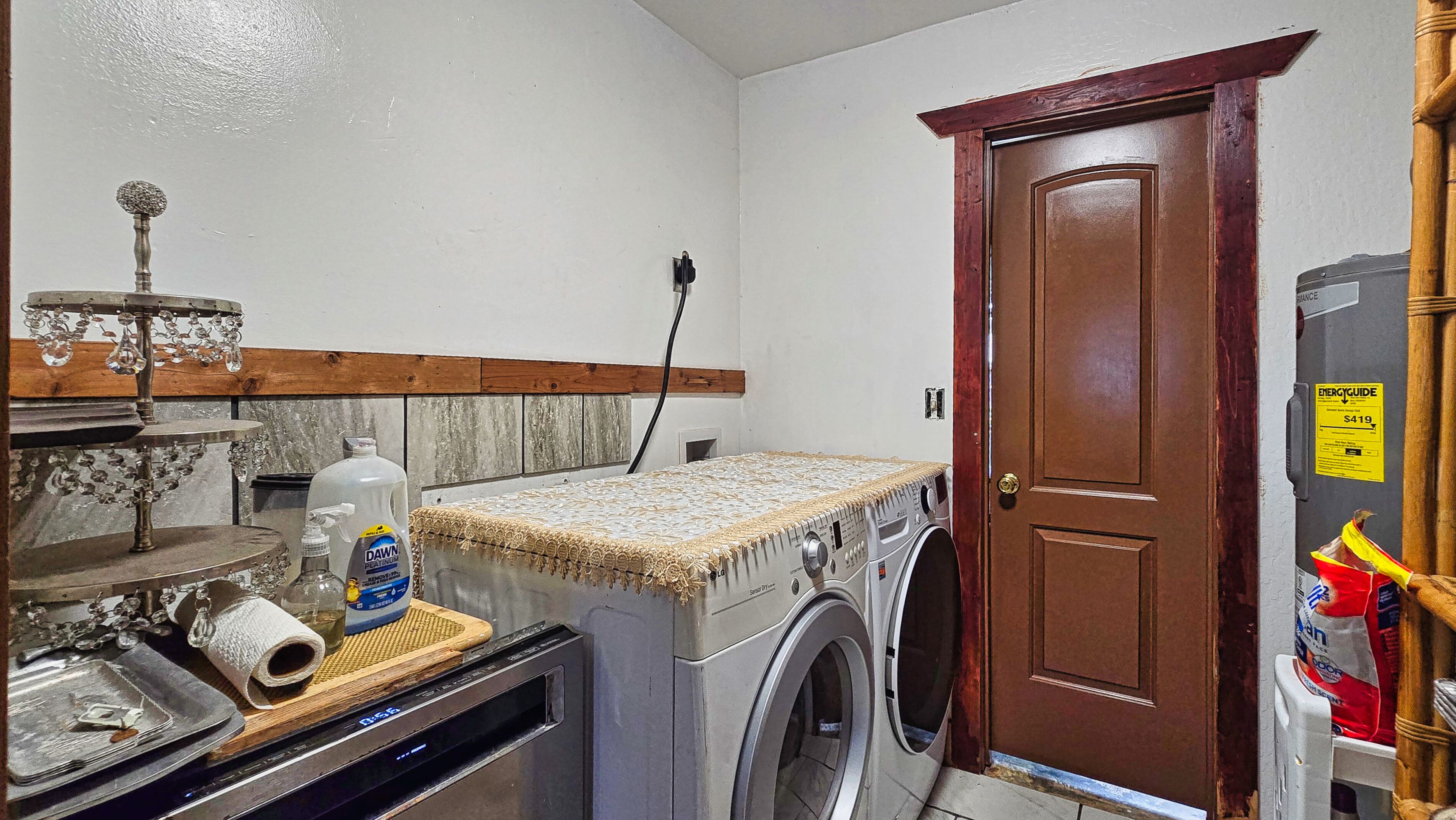 94-6491 Kamaoa Road Naalehu, HI 96772 - Photo 17 of 30 a utility room with dryer and washer