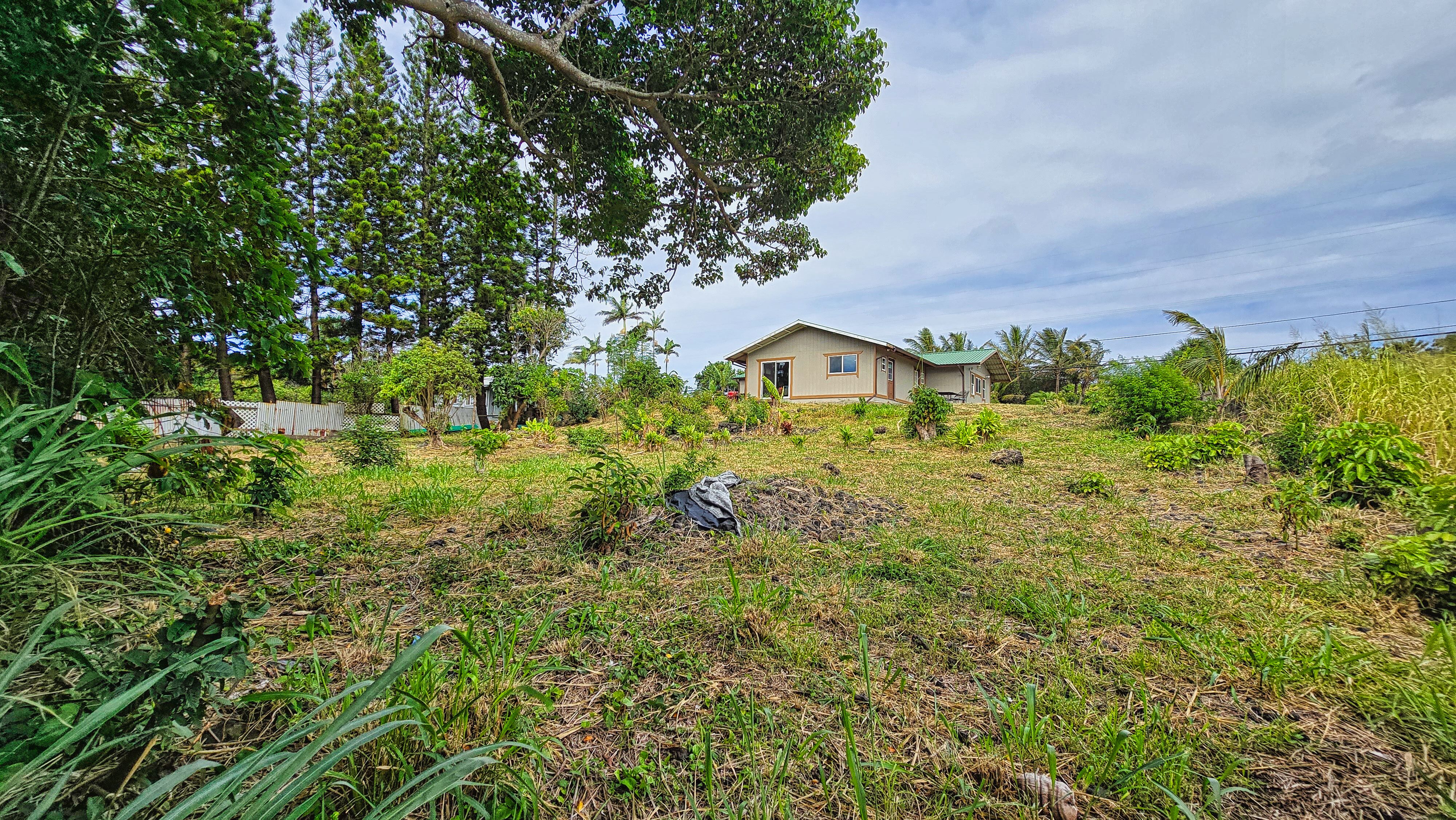 94-6491 Kamaoa Road Naalehu, HI 96772 - Photo 22 of 30 a view of front of house with a yard