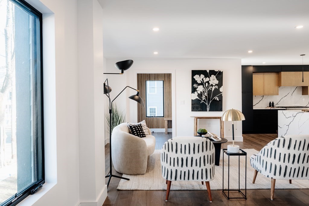 14 Edith Street, Unit 14 Arlington, MA 02474 - Photo 15 of 42 a living room with furniture and a window