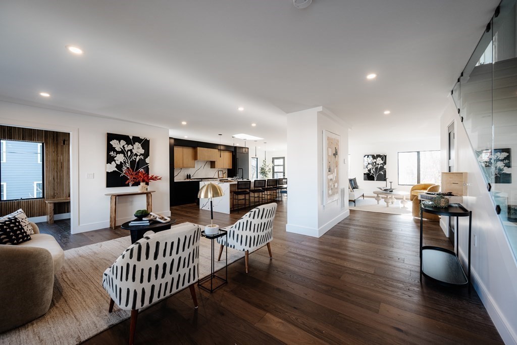 14 Edith Street, Unit 14 Arlington, MA 02474 - Photo 16 of 42 a living room with furniture and a wooden floor
