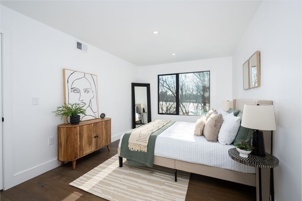 14 Edith Street, Unit 14 Arlington, MA 02474 - Photo 21 of 42 a bedroom with bed and window