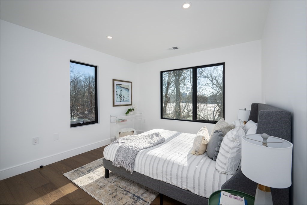 14 Edith Street, Unit 14 Arlington, MA 02474 - Photo 23 of 42 a bedroom with a bed and a window