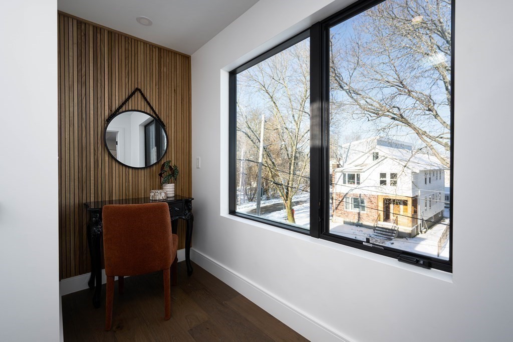 14 Edith Street, Unit 14 Arlington, MA 02474 - Photo 26 of 42 a room with furniture and a window