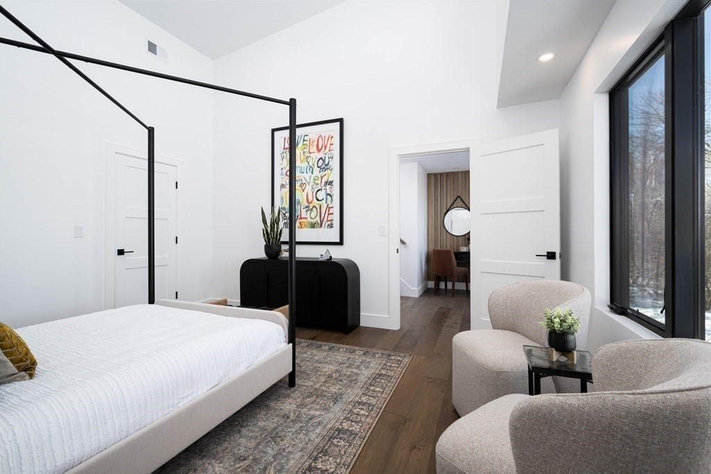 14 Edith Street, Unit 14 Arlington, MA 02474 - Photo 30 of 42 a bedroom with bed couch and window