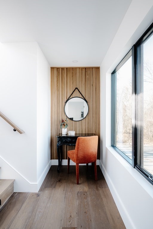 14 Edith Street, Unit 14 Arlington, MA 02474 - Photo 37 of 42 a view of a room with a wooden floor and a windows