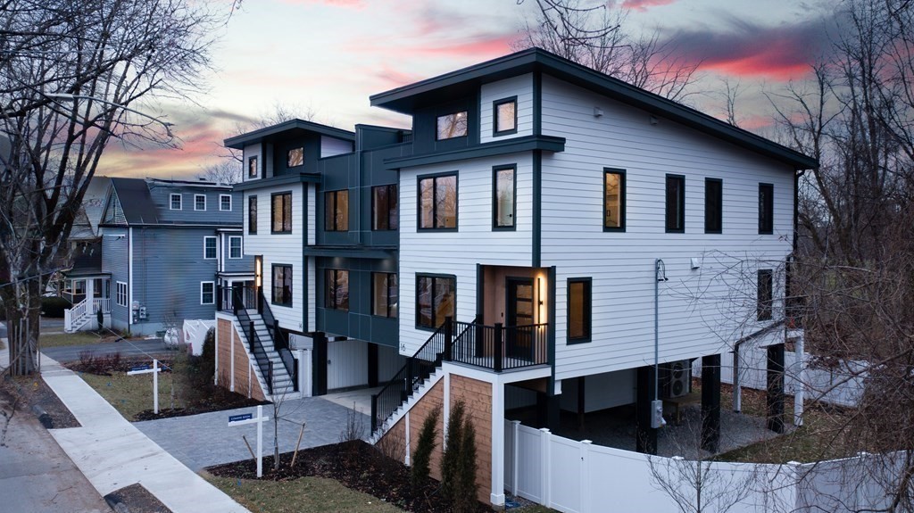 14 Edith Street, Unit 14 Arlington, MA 02474 - Photo 38 of 42 a front view of a house with many windows