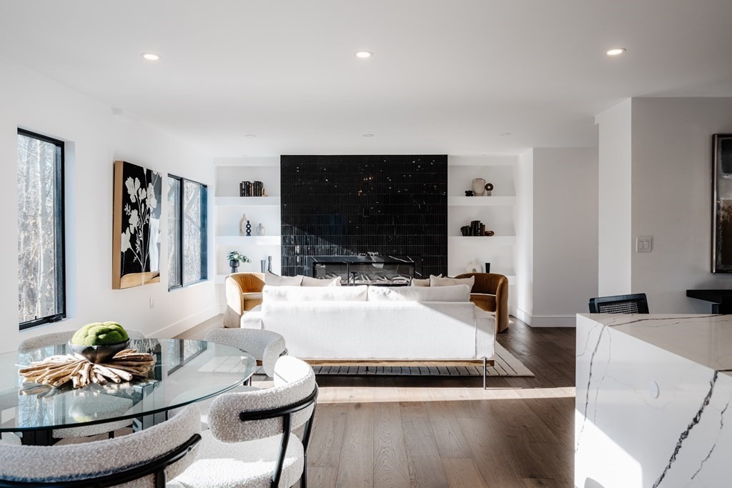 14 Edith Street, Unit 14 Arlington, MA 02474 - Photo 4 of 42 a living room with furniture and a flat screen tv