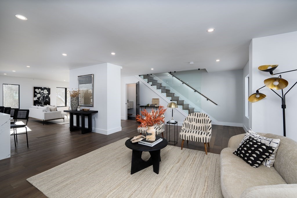 14 Edith Street, Unit 14 Arlington, MA 02474 - Photo 5 of 42 a living room with furniture and wooden floor