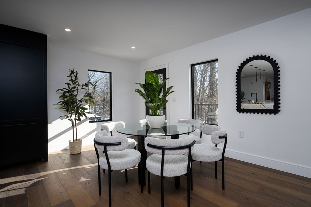 14 Edith Street, Unit 14 Arlington, MA 02474 - Photo 10 of 42 a view of a dining room with furniture and wooden floor