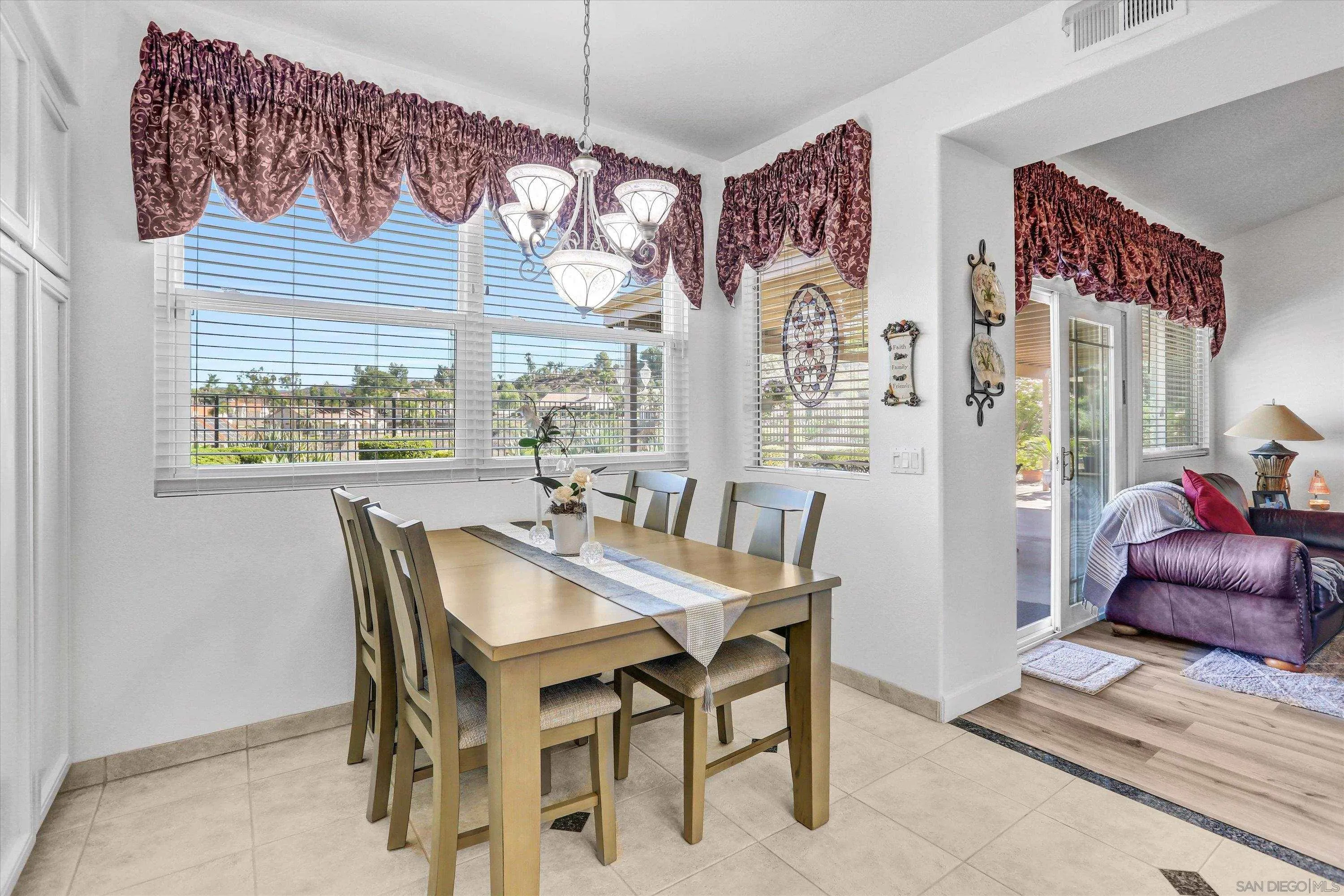 8983 Chestnut Roan Way Alpine, CA 91901 - Photo 13 of 33 a dining room with furniture and window