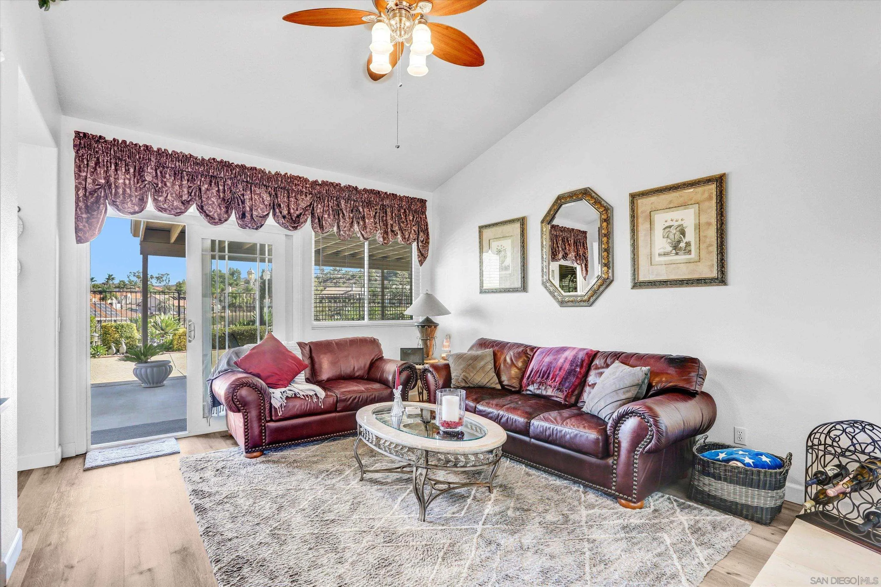 8983 Chestnut Roan Way Alpine, CA 91901 - Photo 15 of 33 a living room with furniture and a large window