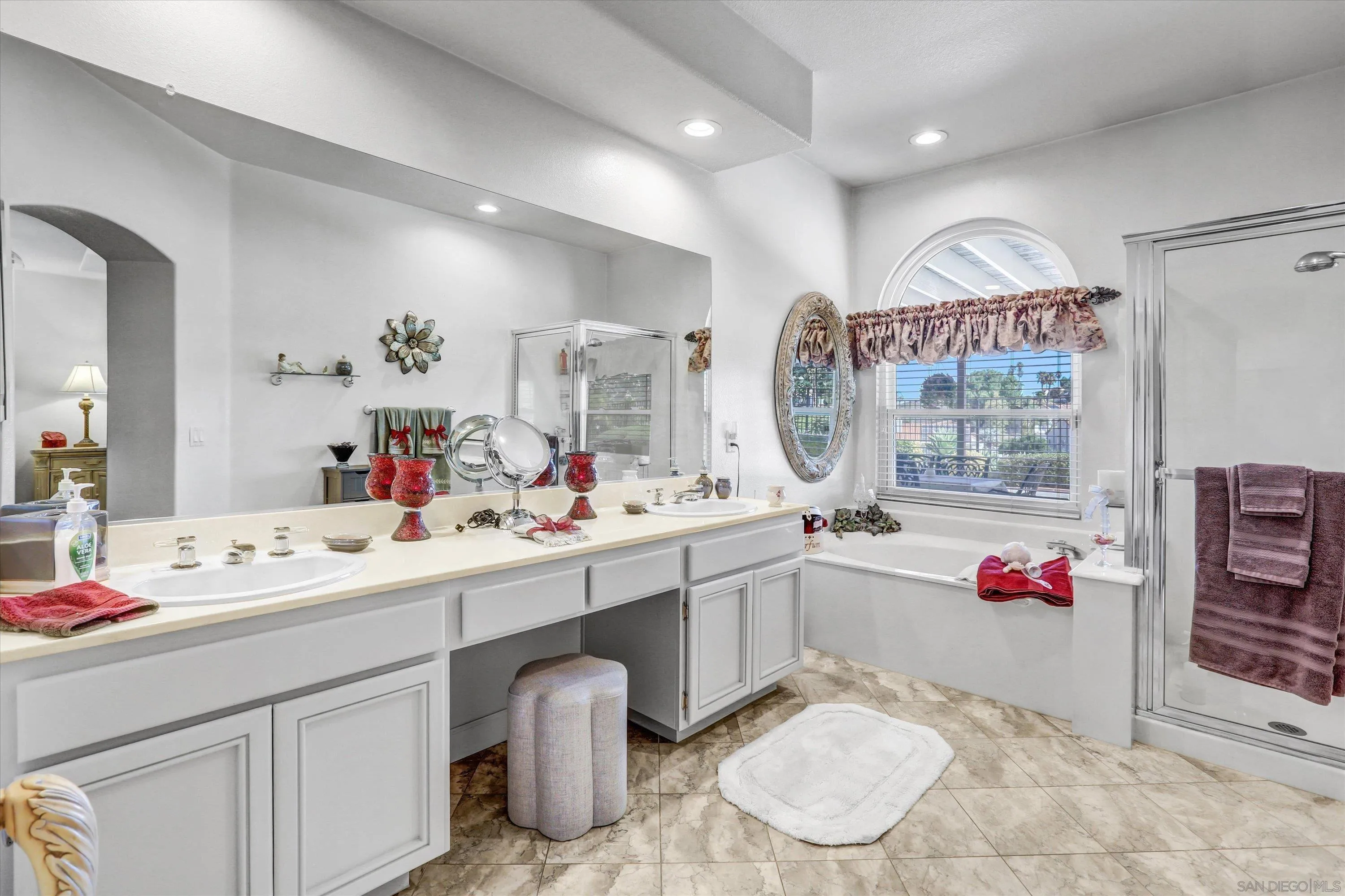 8983 Chestnut Roan Way Alpine, CA 91901 - Photo 21 of 33 a spacious bathroom with a sink mirror and vanity