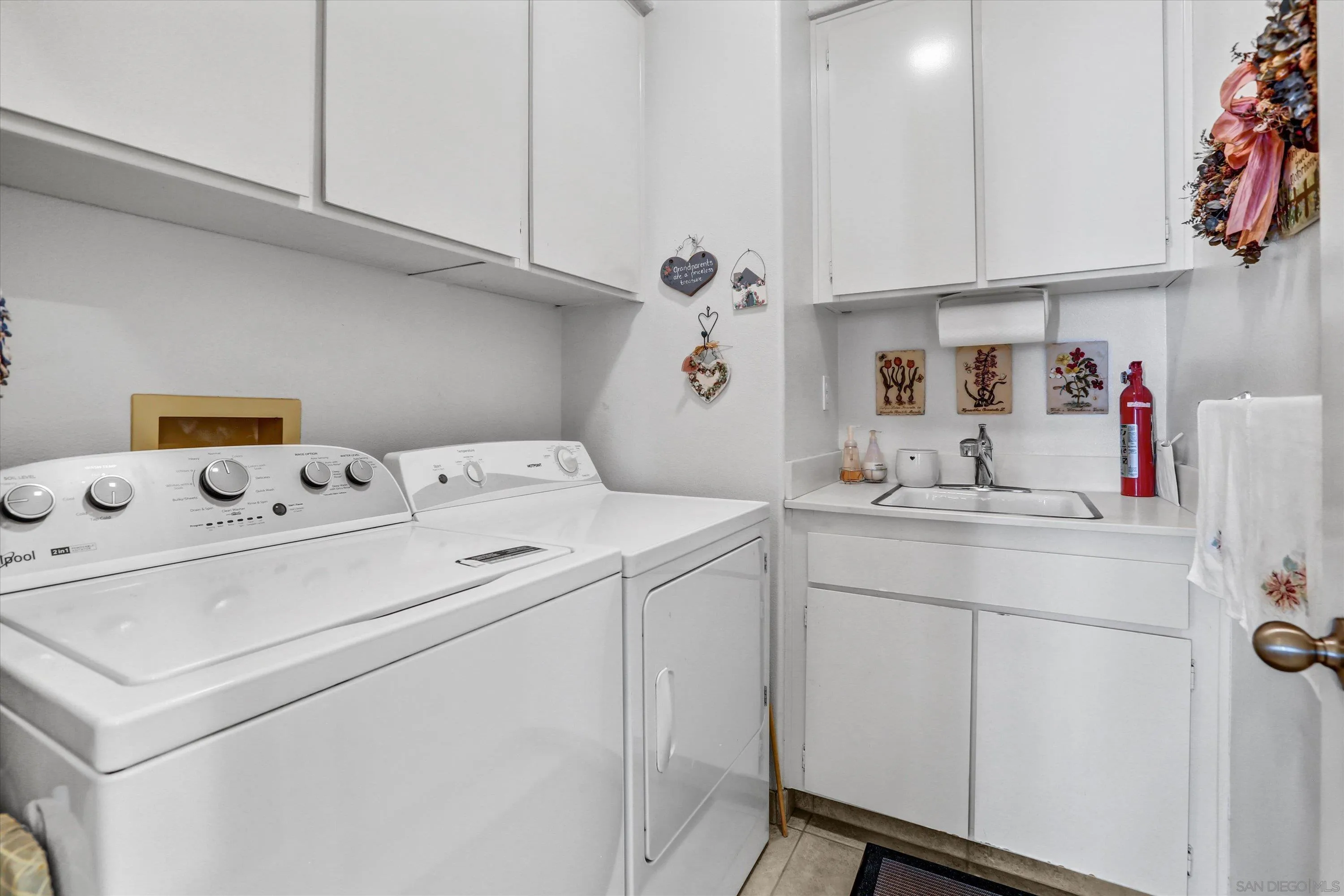 8983 Chestnut Roan Way Alpine, CA 91901 - Photo 26 of 33 a utility room with dryer and washer