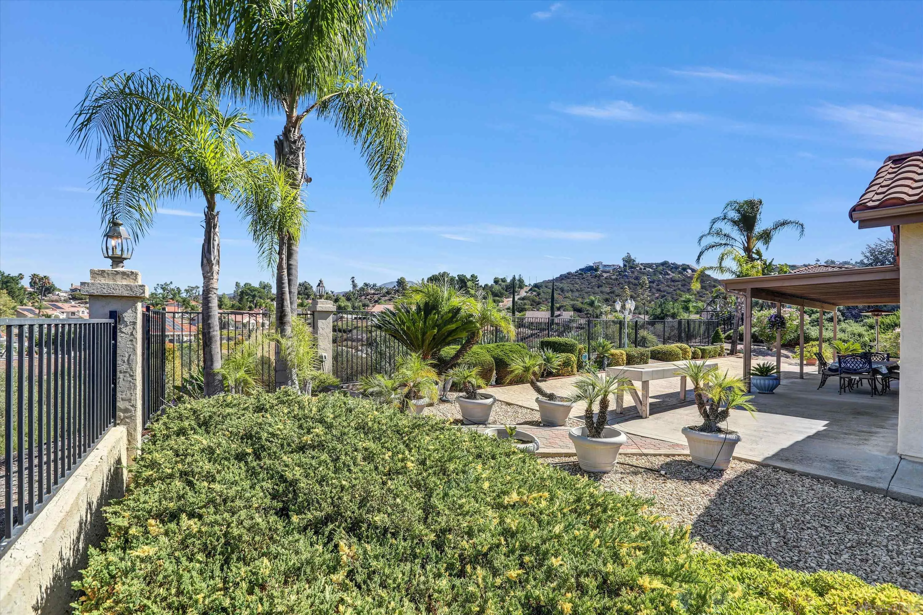 8983 Chestnut Roan Way Alpine, CA 91901 - Photo 28 of 33 a view of a water fountain and a big yard