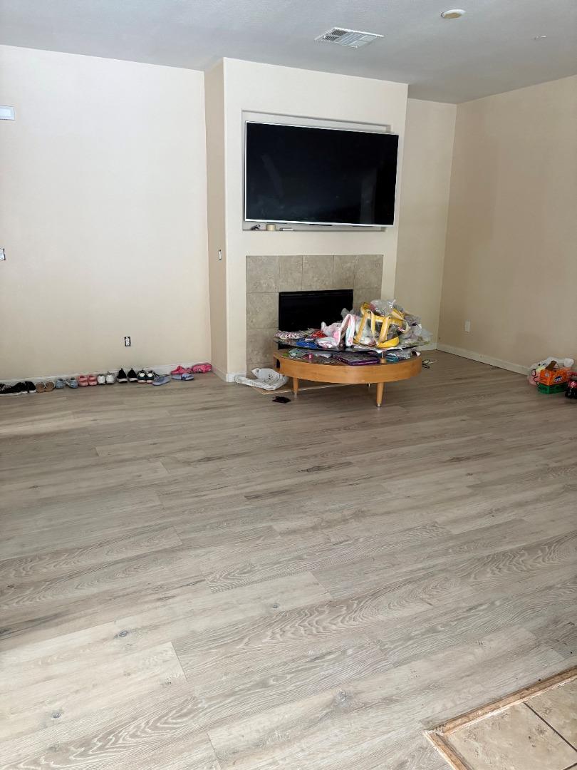 2289 Rutland Court Fairfield, CA 94533 - Photo 4 of 4 a living room with furniture and a fireplace