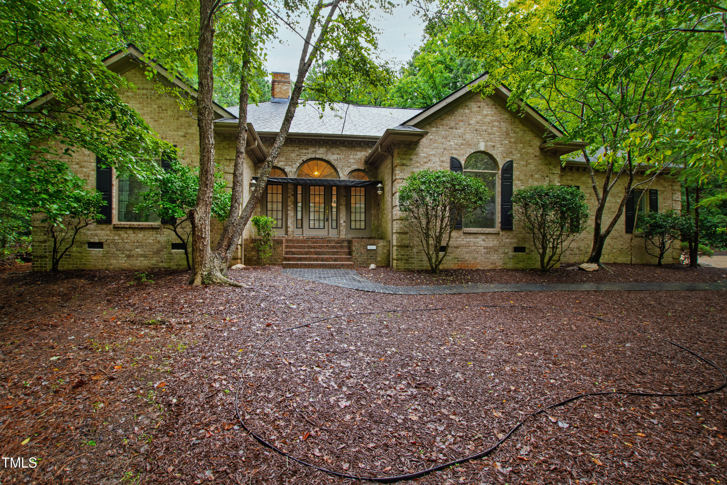 2517 High Ridge Drive Raleigh, NC 27606 - Photo 1 of 69 a view of a house with a yard and hanging chair