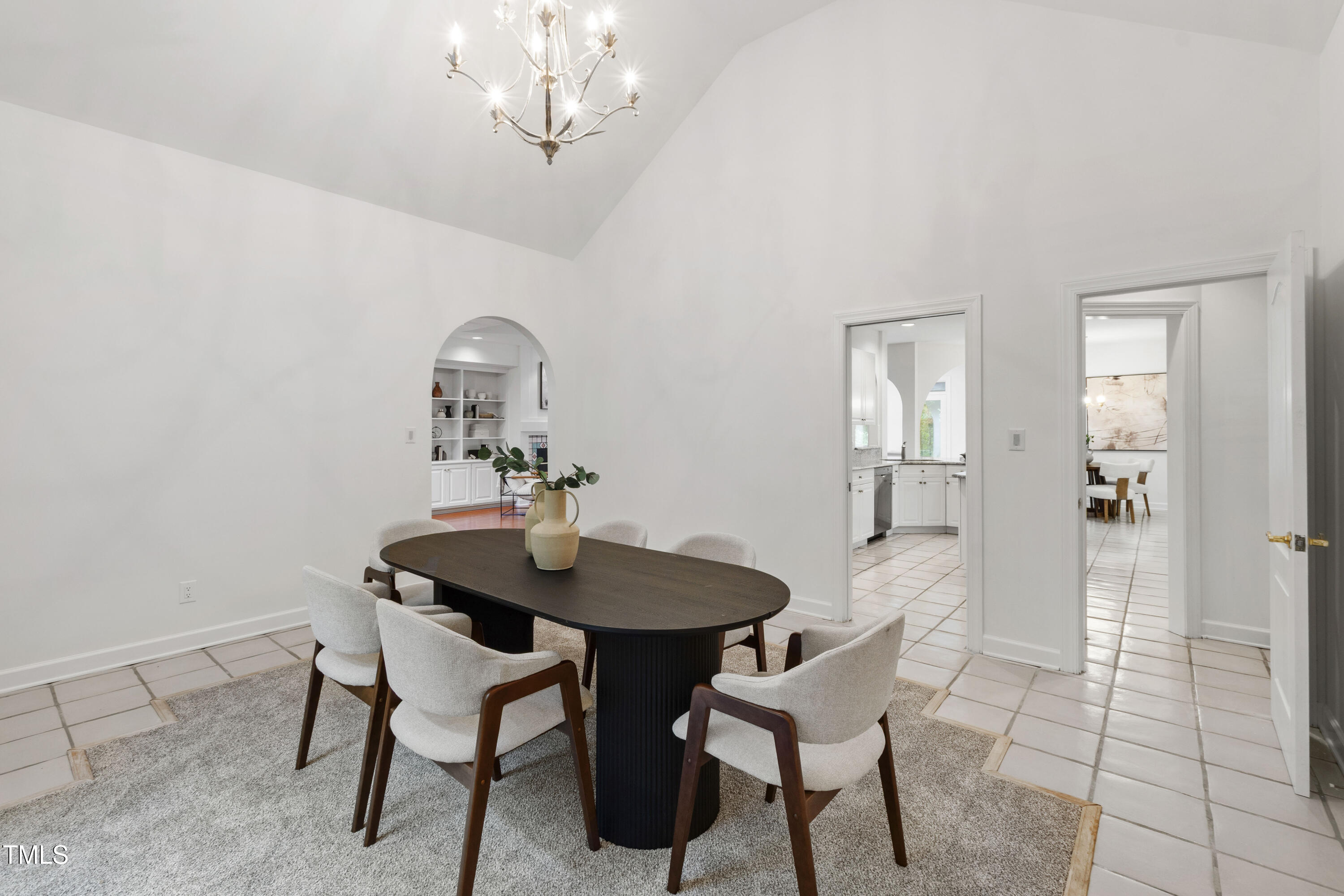 2517 High Ridge Drive Raleigh, NC 27606 - Photo 12 of 69 a view of a dining room with furniture and chandelier