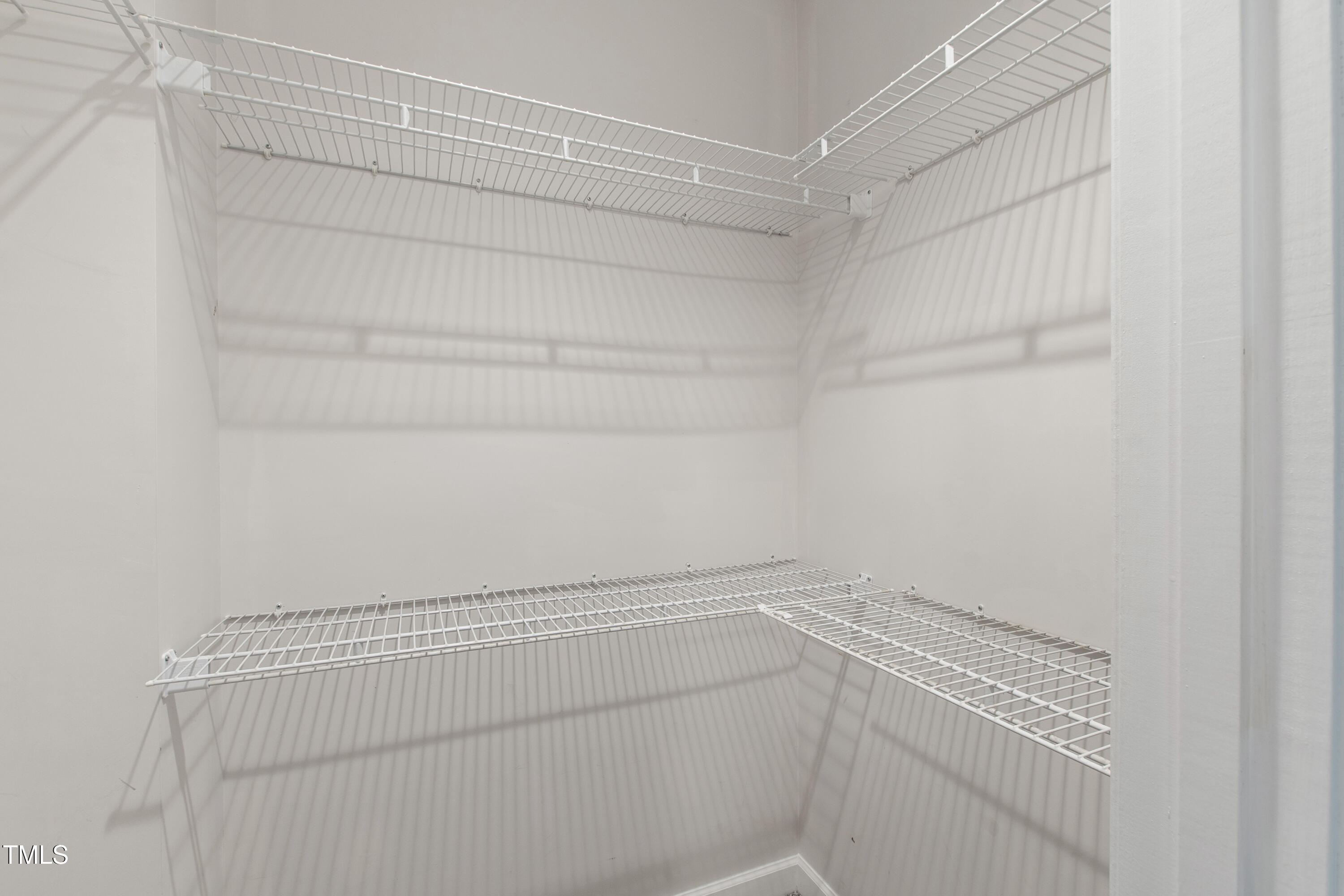 2517 High Ridge Drive Raleigh, NC 27606 - Photo 43 of 69 a view of a room with racks on the wall