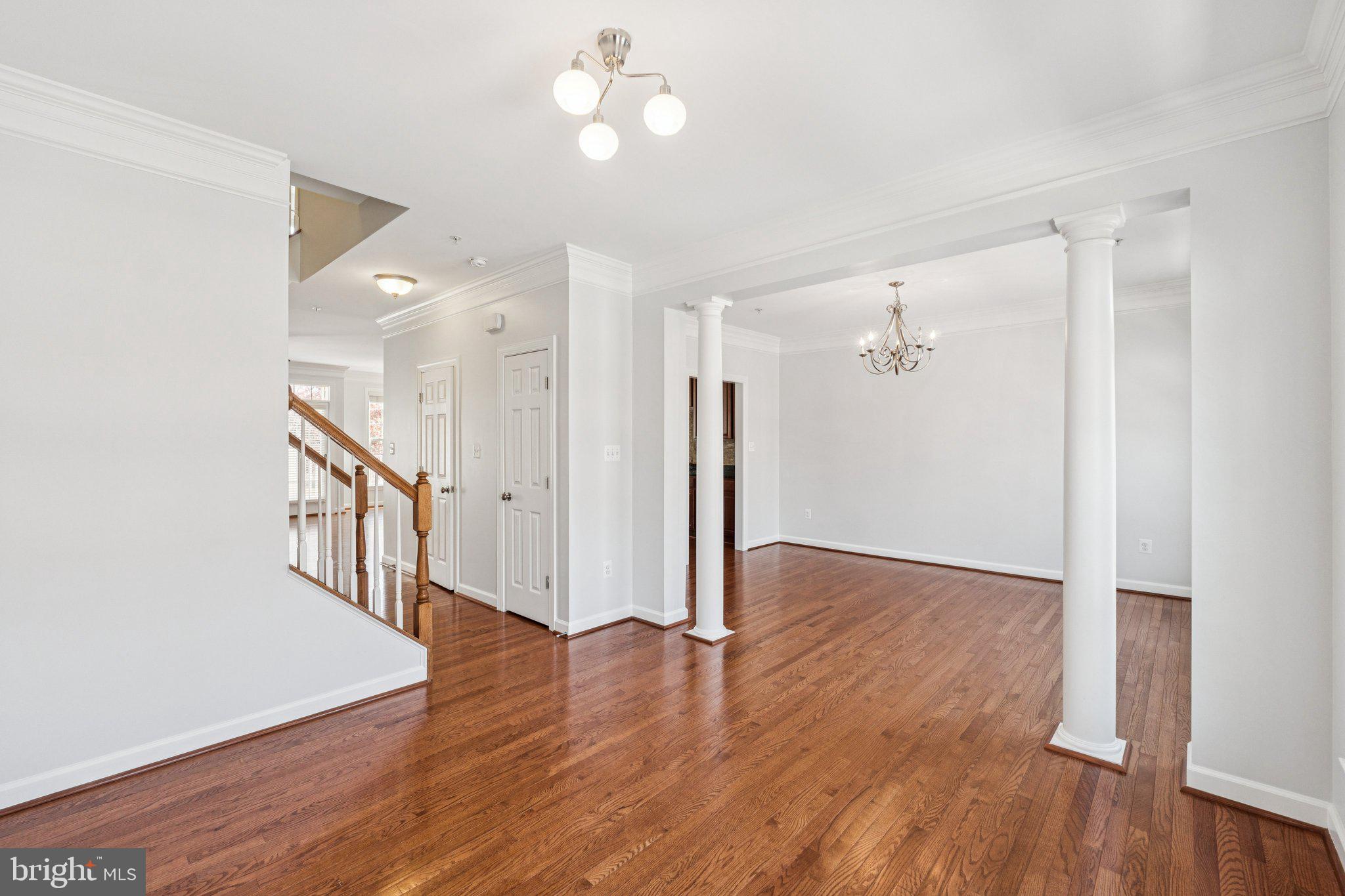 125 Autumn View Drive Gaithersburg, MD 20878 - Photo 17 of 38 a view of a hallway with wooden floor
