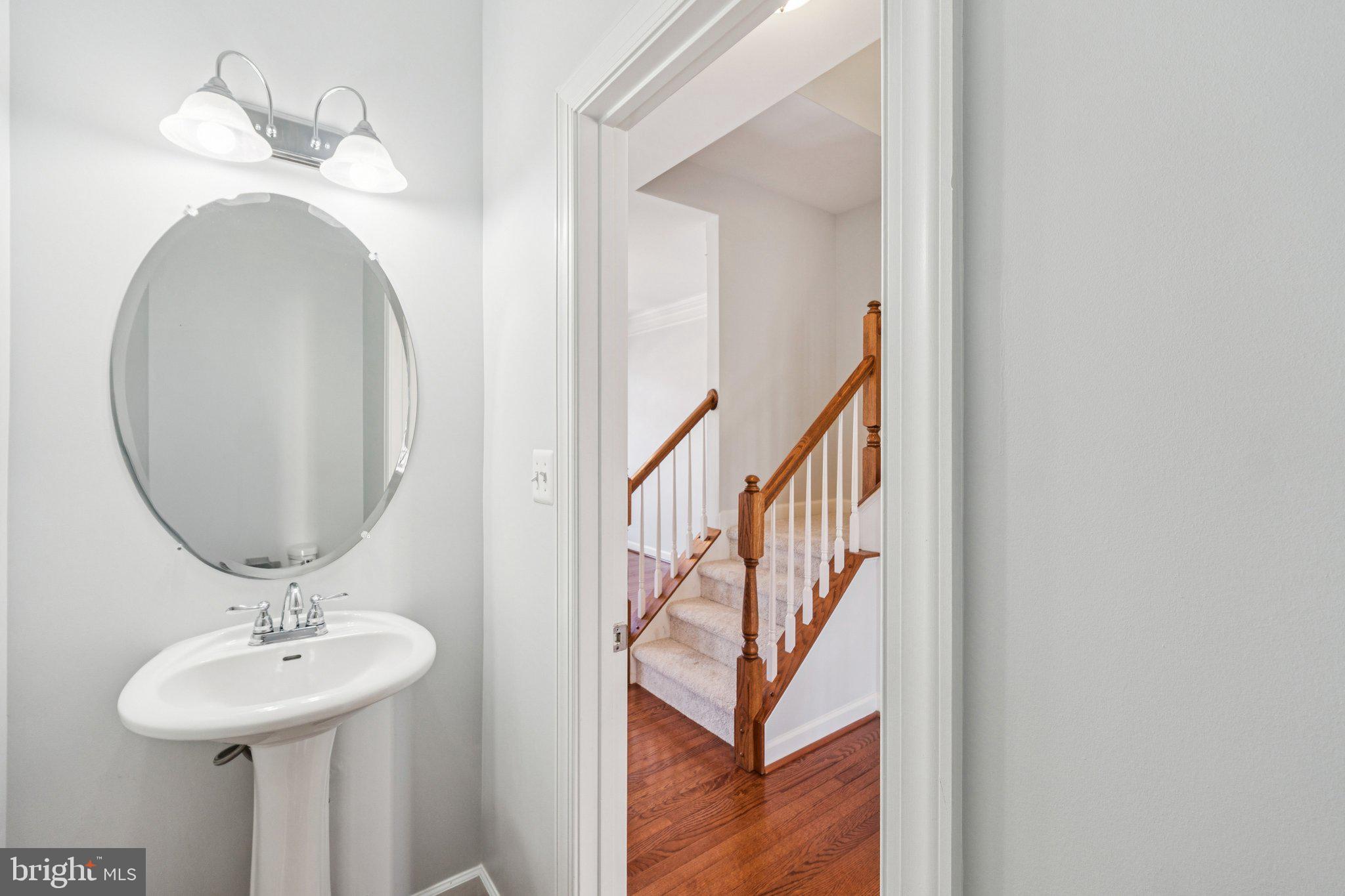 125 Autumn View Drive Gaithersburg, MD 20878 - Photo 18 of 38 a view of a hallway with wooden floor and entryway