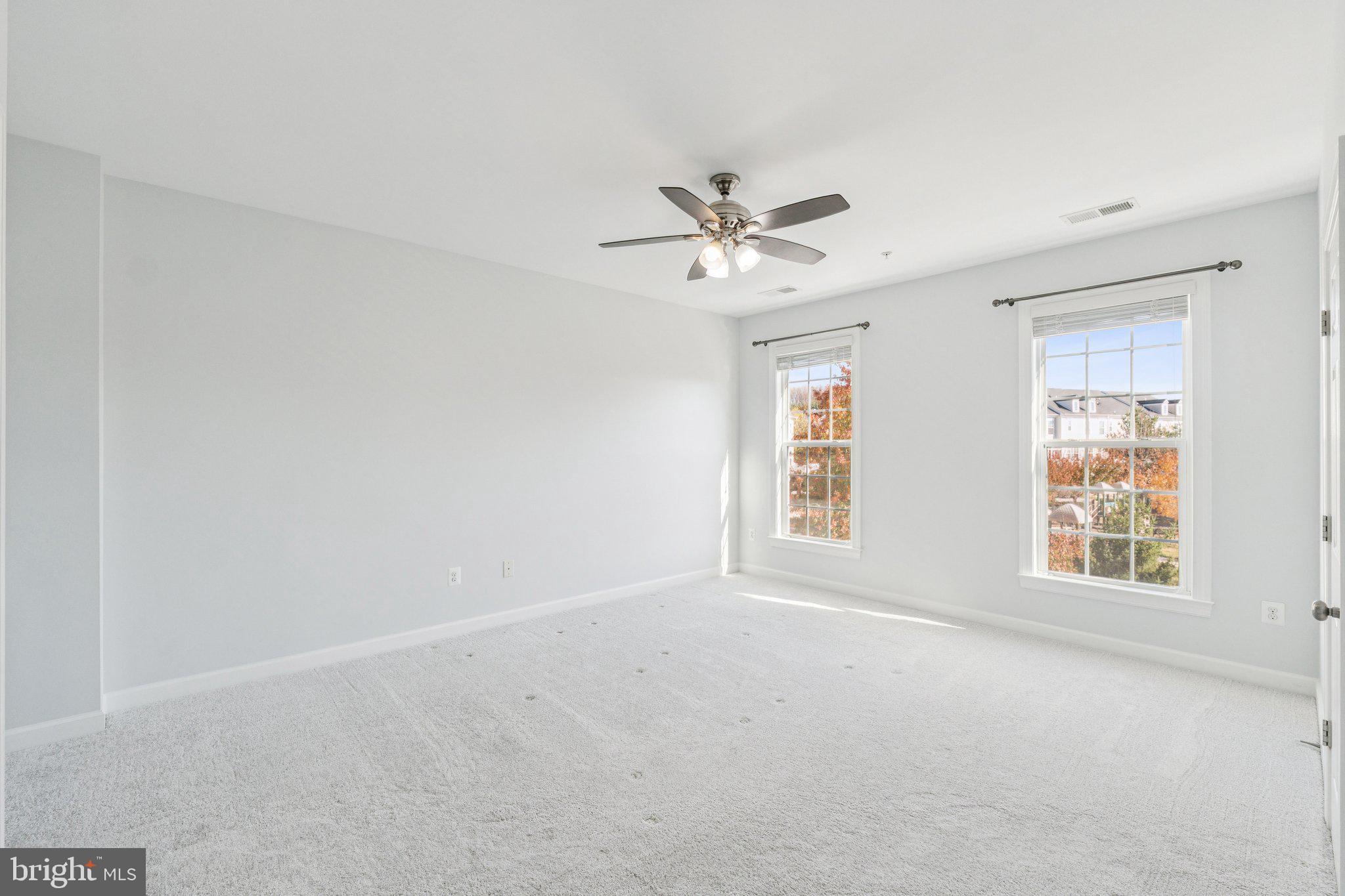 125 Autumn View Drive Gaithersburg, MD 20878 - Photo 19 of 38 a view of an empty room with a window