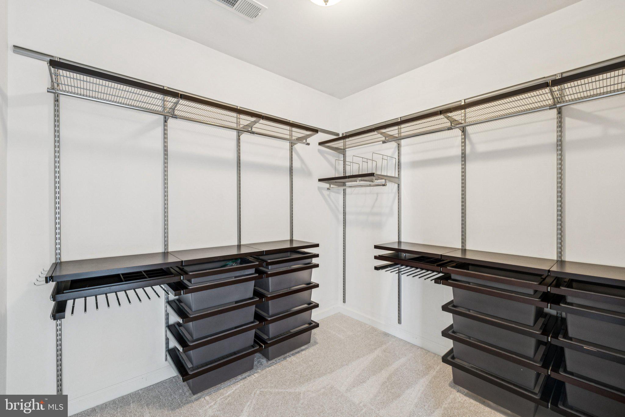 125 Autumn View Drive Gaithersburg, MD 20878 - Photo 22 of 38 a view of a closet area with lots of racks on the wall