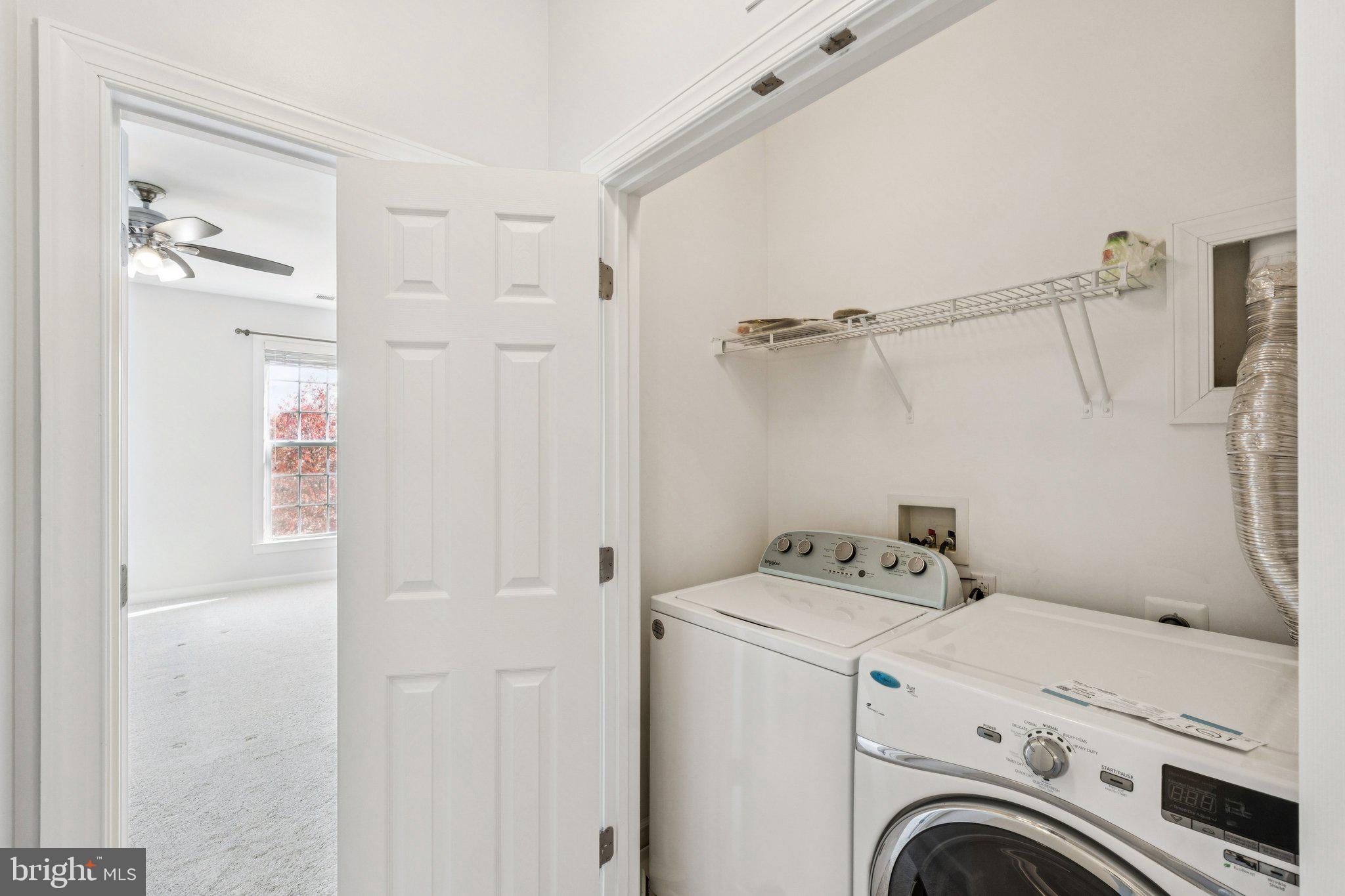 125 Autumn View Drive Gaithersburg, MD 20878 - Photo 25 of 38 a utility room with dryer and washer