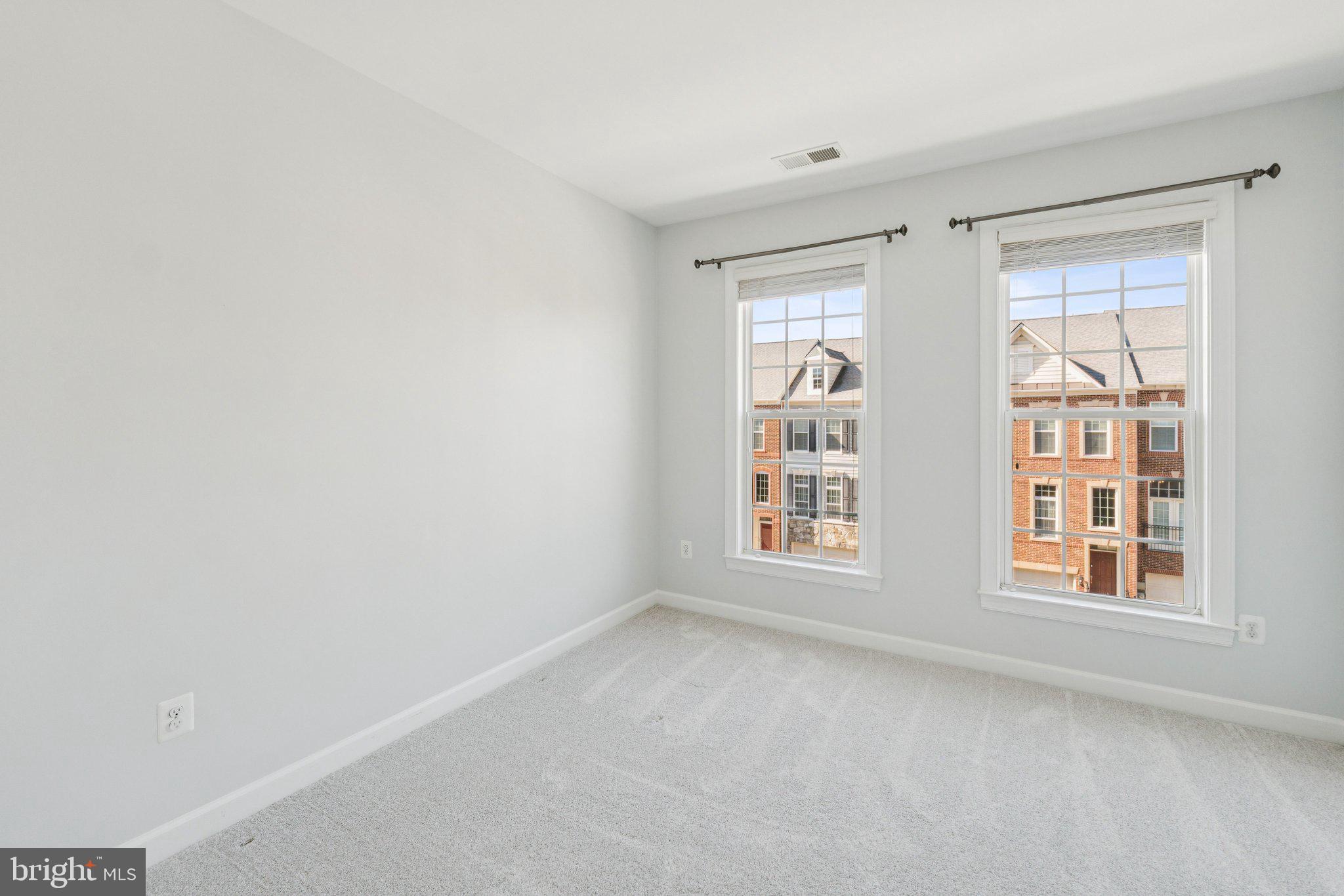 125 Autumn View Drive Gaithersburg, MD 20878 - Photo 26 of 38 a view of an empty room with a window