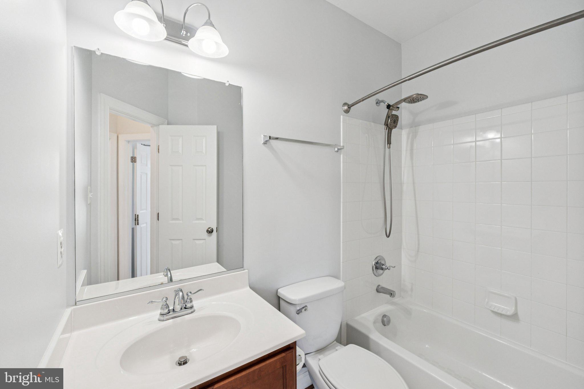125 Autumn View Drive Gaithersburg, MD 20878 - Photo 28 of 38 a bathroom with a sink toilet tub and shower