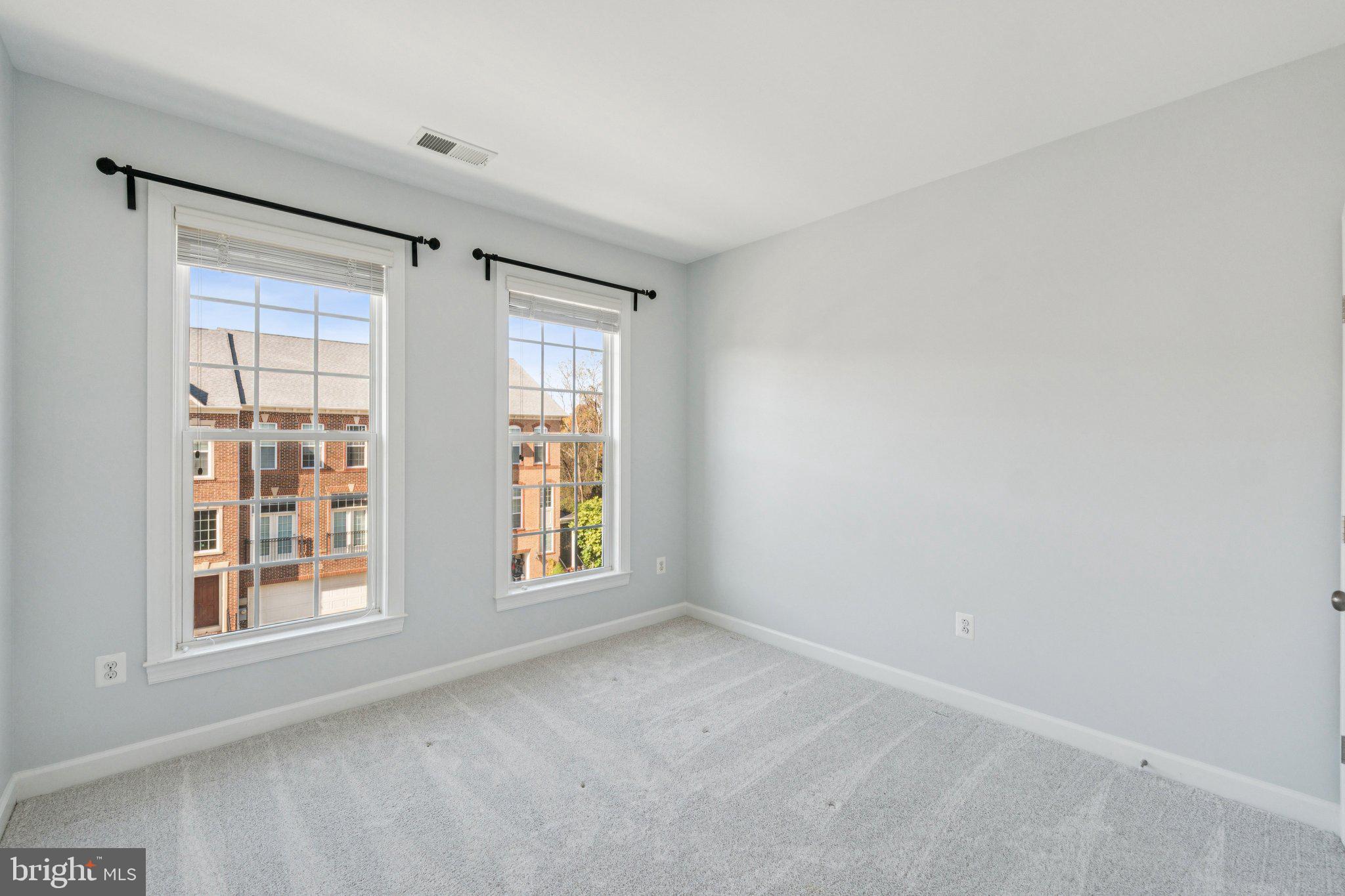 125 Autumn View Drive Gaithersburg, MD 20878 - Photo 29 of 38 an empty room with windows and entrance
