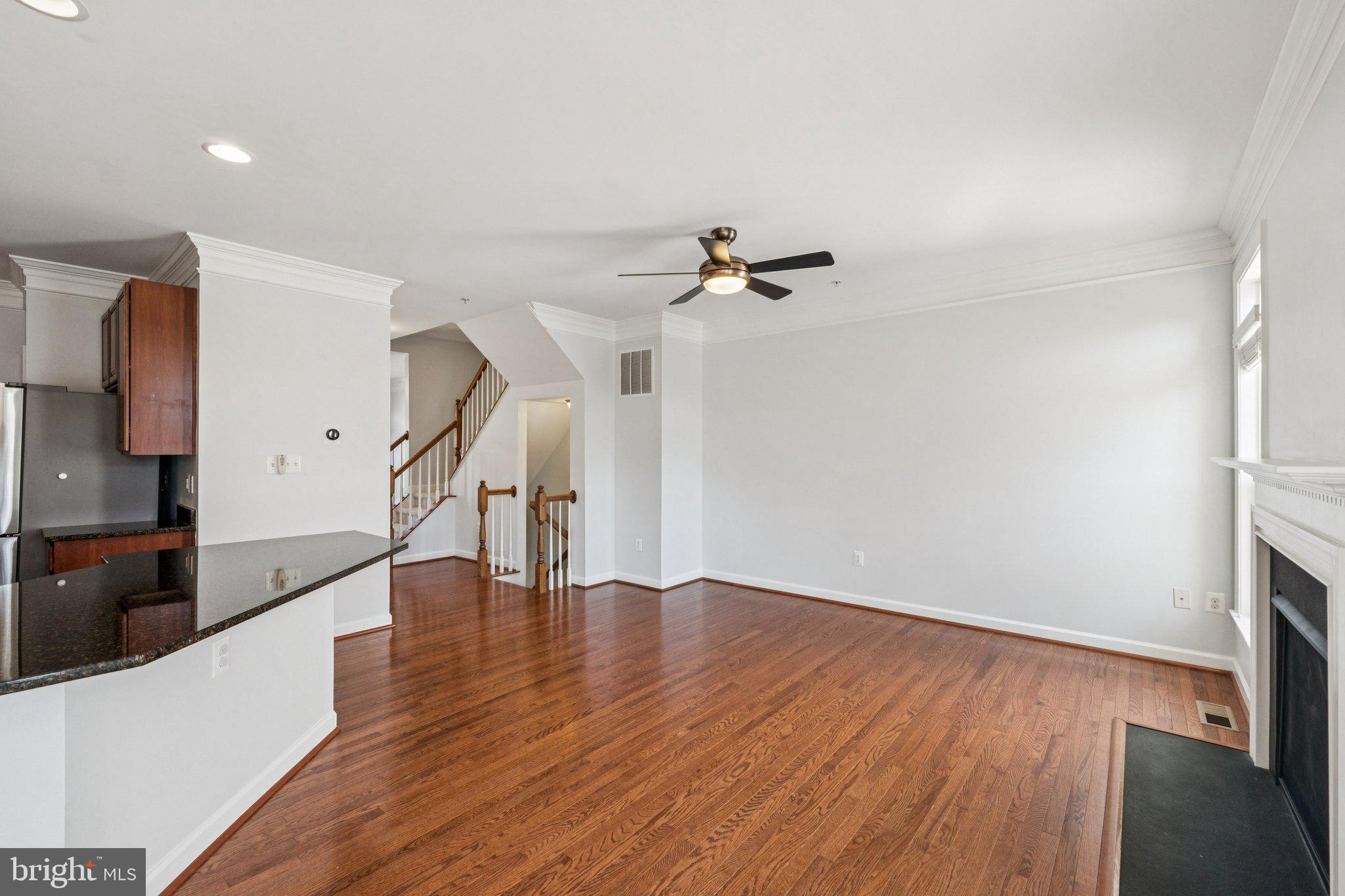 125 Autumn View Drive Gaithersburg, MD 20878 - Photo 6 of 38 a view of empty room with wooden floor and fan